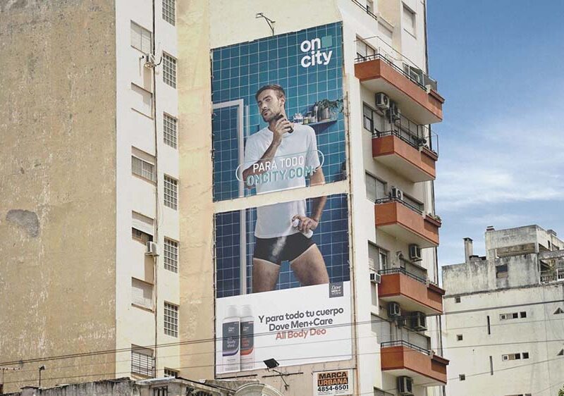 Dove Men+Care irrumpe en la vía pública interviniendo carteles de otras marcas para presentar All Body Deo